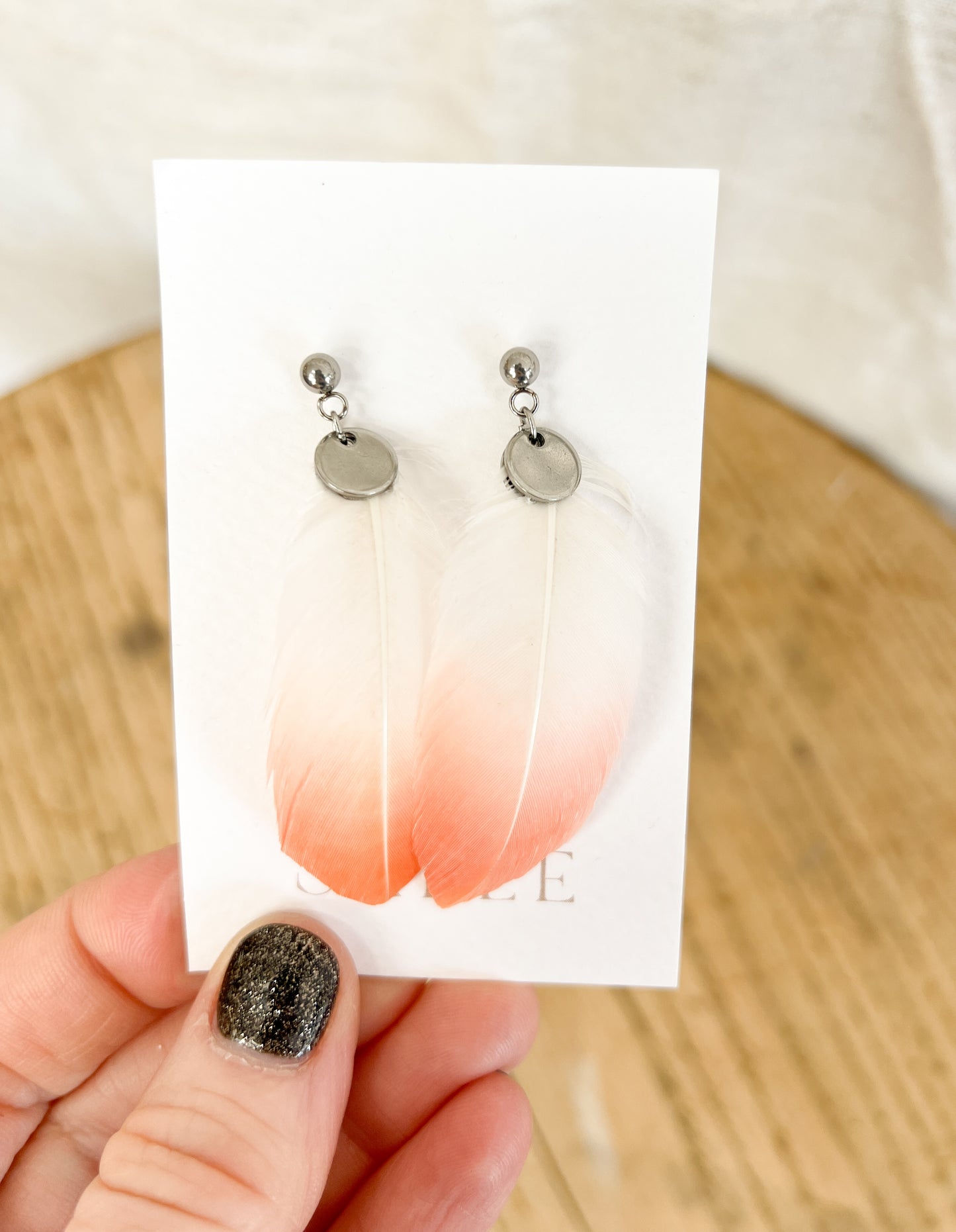 Boucles d'oreilles plumes de Flamant Rose